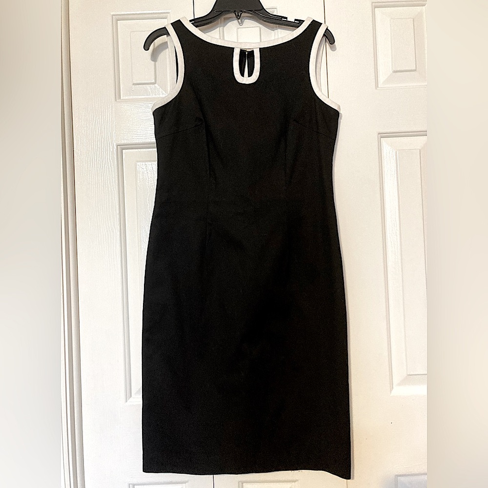 Talbots size 8 black dress with white trim detail and keyhole design.